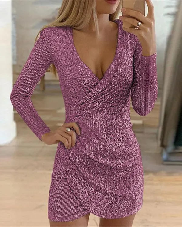 Jordana - Asymmetrical sequin dress with deep neckline and long sleeves