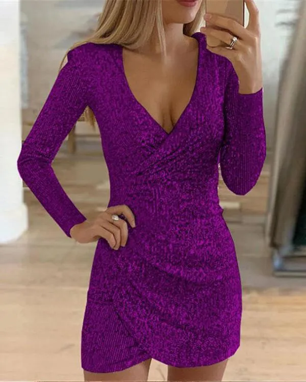 Jordana - Asymmetrical sequin dress with deep neckline and long sleeves