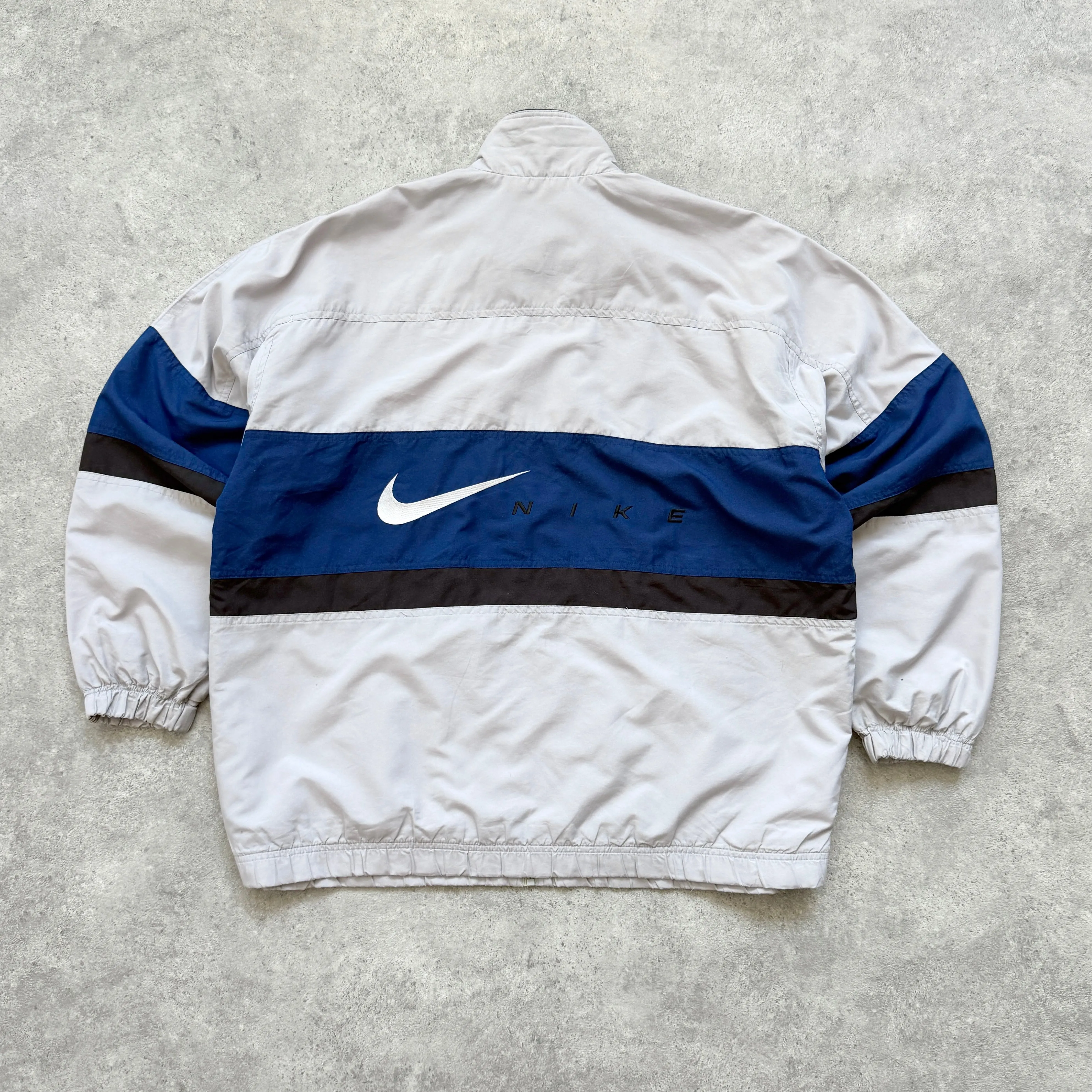 Nike 1990s lightweight embroidered spellout track jacket (L)