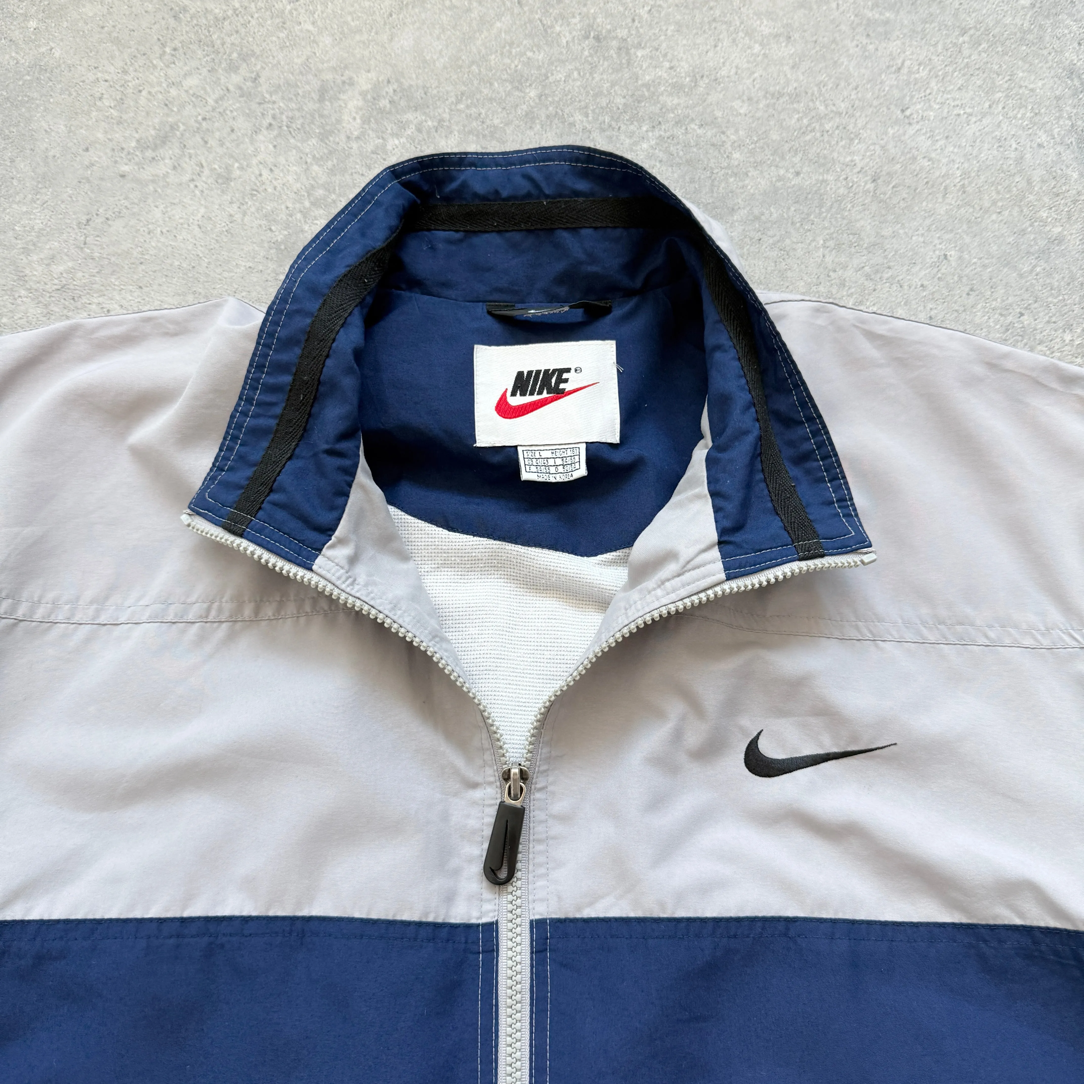 Nike 1990s lightweight embroidered spellout track jacket (L)
