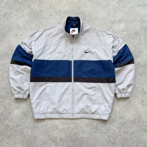 Nike 1990s lightweight embroidered spellout track jacket (L)